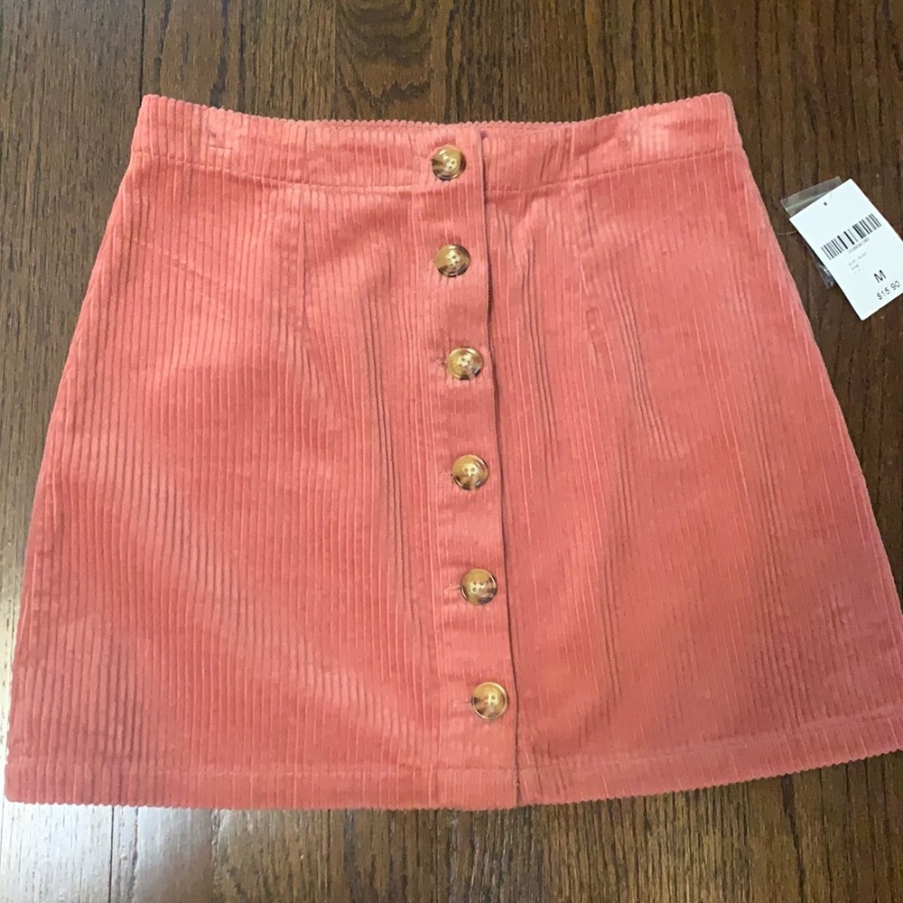 Pink corduroy button up mini skirt
